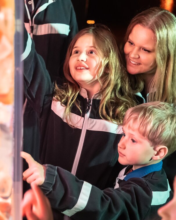 Family admiring a pillar made of rock salt